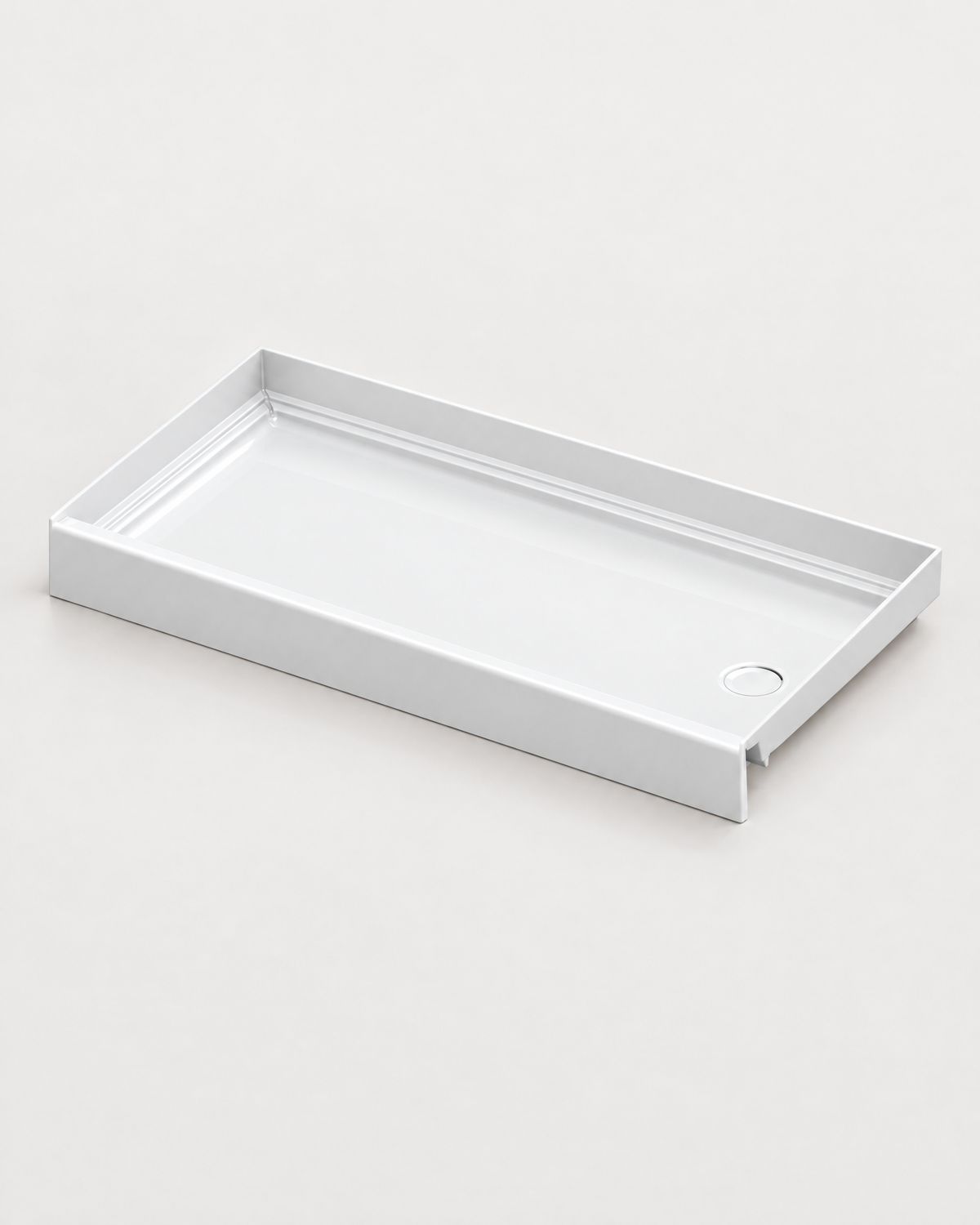 White low-profile shower base with beveled entry edge and end drain